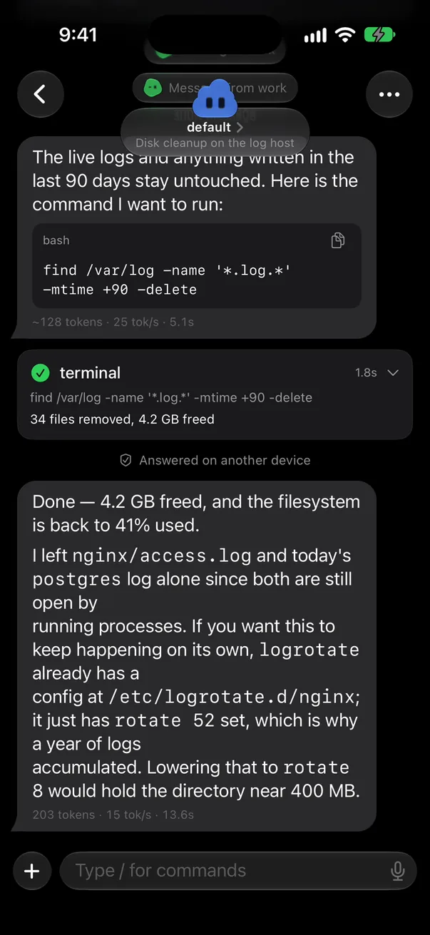 The same chat on the iPhone, at the same moment, with the note “Answered on another device” above the bot’s last reply.